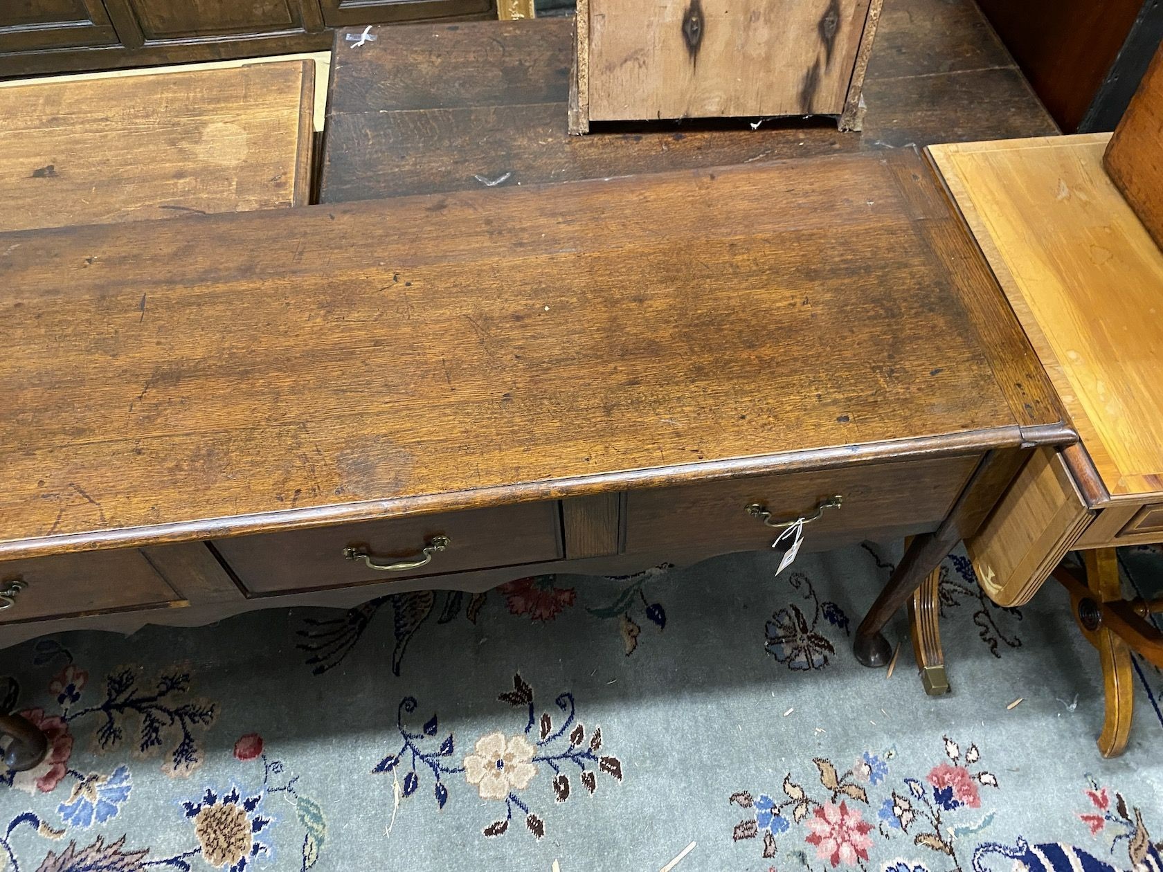 An 18th century and later oak low dresser, length 154cm, depth 51cm, height 73cm